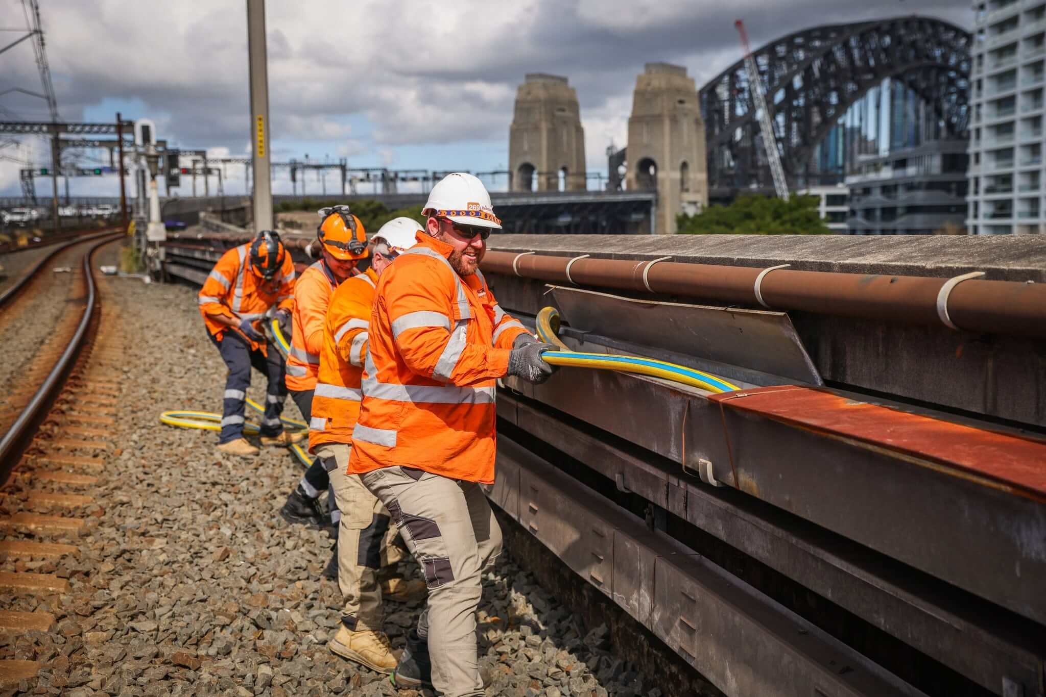 Industrial workers repairing rails